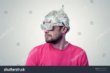 stock-photo-bearded-funny-man-in-a-cap-of-aluminum-foil-concept-art-phobias-272097020.webp