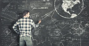 teenager-solving-some-math-problems-on-blackboard.webp