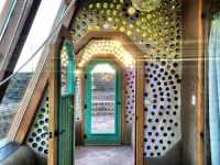 EarthshipCommunity+bottle+sunset.webp
