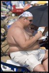 fat-shirtless-guy-eating-cheeseburger-1_3[1].jpg