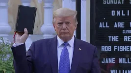 trump holding bible.webp