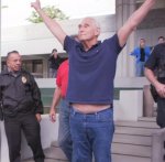 Richard_Stone_making_the_V_sign_after_his_arrest_and_indictment.jpg