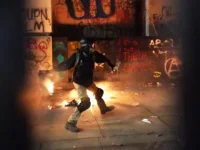 portland-riot-burning-trash-fire-getty-420x315.webp