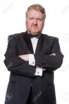 23923735-tough-man-in-tuxedo-with-arms-crossed.jpg