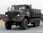 US_Marine_Corps_030224-M-XT622-034_USMC_M923_(6X6)_5-ton_cargo_truck_heads_a_convoy_departing_...jpg