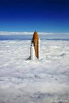 space shuttle nose thru clouds weird.jpg