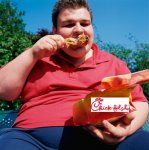 Eats_Obesity_ObeseManEatingFriedChicken[1].jpg