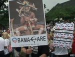 art.obama.protest.sign.cnn.jpg