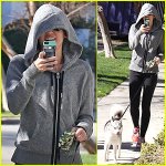 miley-cyrus-hoodie-walk-with-pet-pooch.jpg