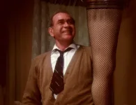 old-man-admiring-major-award.webp