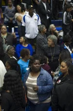 1413797827195_wps_16_People_walk_out_of_the_gy.webp