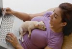 photolibrary_rf_photo_of_puppy_laying_on_woman.jpg