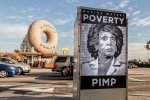 Maxine-Waters-Poverty-Pimp-Poster-in-front-of-Iconic-Randys-Donuts-02-1024x682.jpg