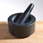 black-granite-mortar-and-pestle-Simon-Pearce-Remodelista_1.jpg