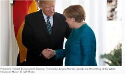 Trump-meets-Merkel-AP.webp