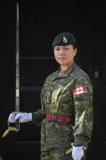 Captain-Megan-Couto-of-the-2nd-Battalion-Princess-Patricias-Canadian-Light-Infantry-poses-for-a.webp