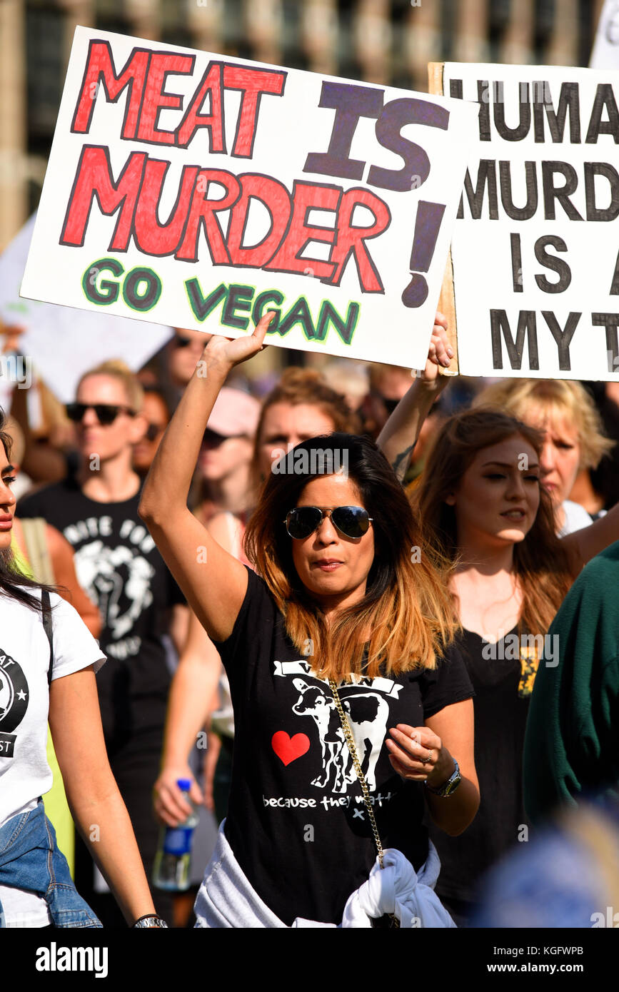 meat-is-murder-placard-female-vegan-activist-protesting-in-whitehall-KGFWPB.jpg